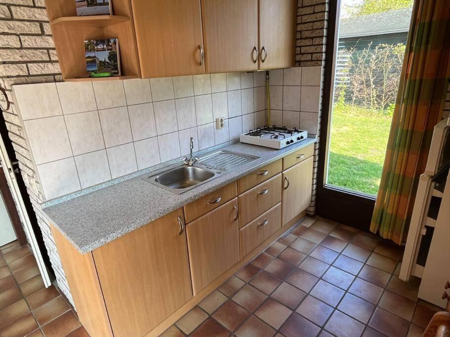 Knusse Bungalow Op Groen Park! Ouddorp Dış mekan fotoğraf